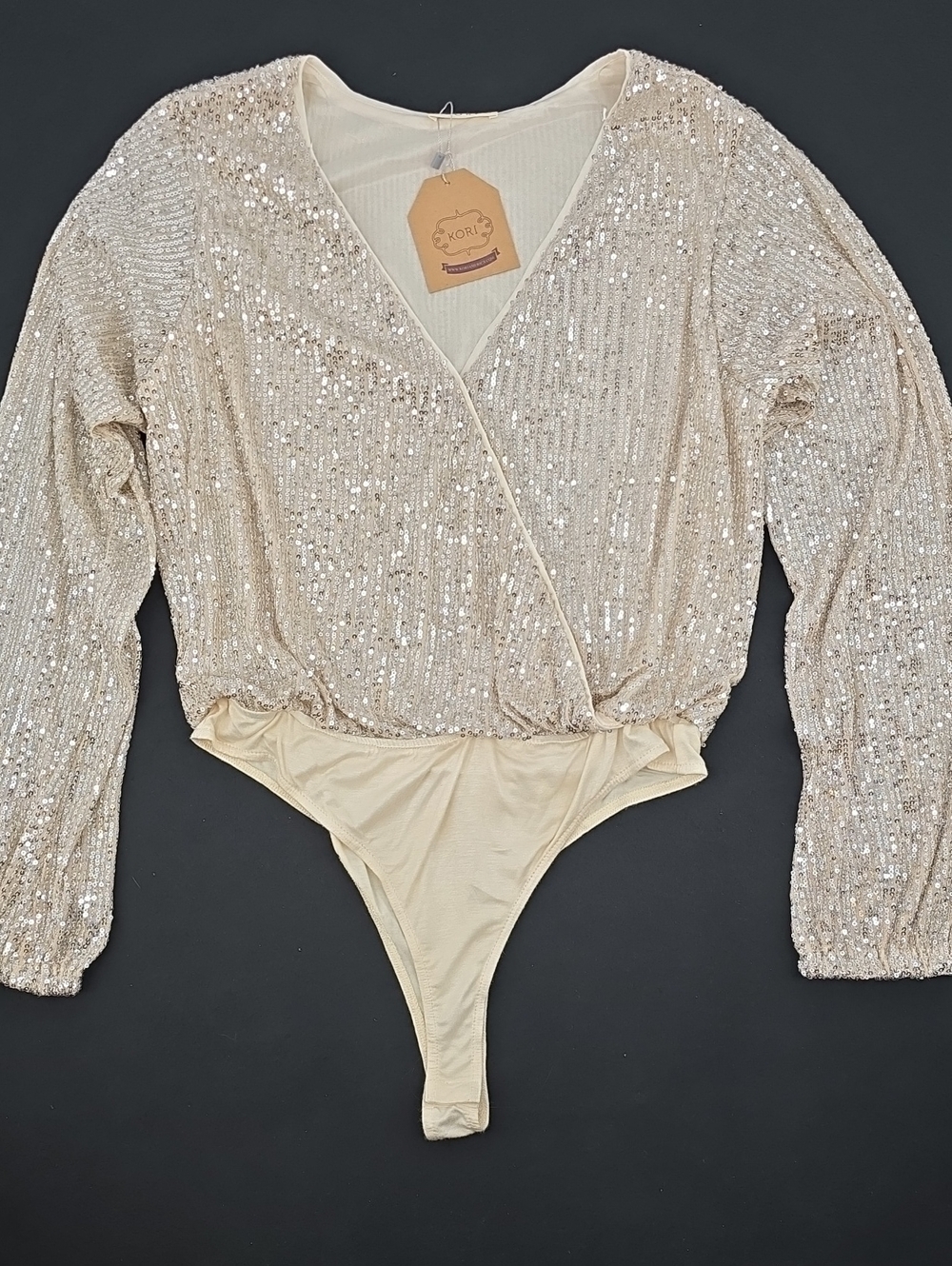 KORI Champagne Gold Sequin Surplice Long Sleeve Bodysuit